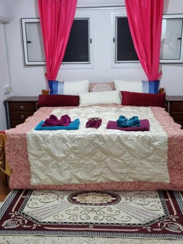 Postel nebo postele na pokoji v ubytování Buenaventura Cosy Apartment kato Paphos
