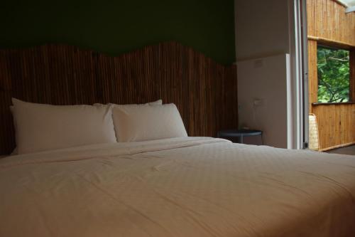 Cama o camas de una habitación en 台東-東河177