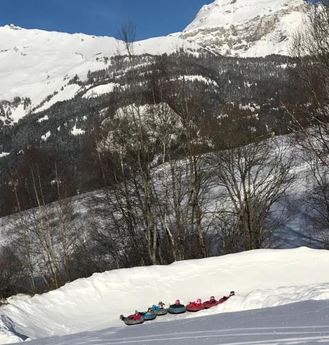 a group of people on skis in the snow at Sorecrans in Crans-Montana