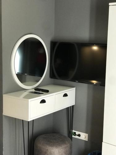 TV a/nebo společenská místnost v ubytování Utarit Hotel