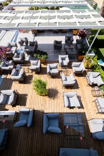 an overhead view of a deck with chairs and tables at Hotel Karbel Sun in Oludeniz