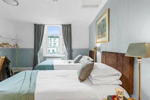Ένα ή περισσότερα κρεβάτια σε δωμάτιο στο Southbank TOWN HOUSE