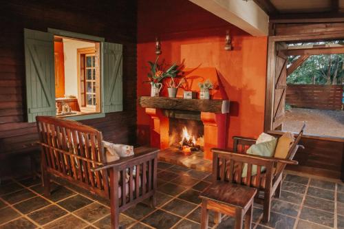 Posezení v ubytování La Vieille Cheminée, Tropical Farm & Eco-Lodges