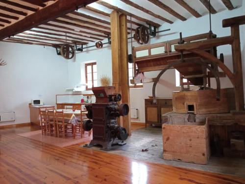 a large room with a kitchen and a dining room at Molino De Pradillo in Pradillo