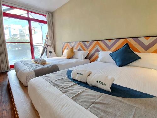 Postel nebo postele na pokoji v ubytování MiM House