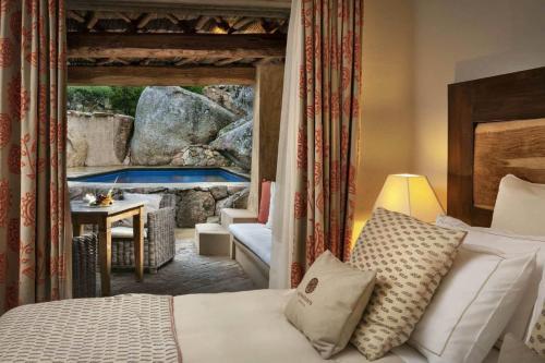 A bed or beds in a room at Petra Segreta Resort & Spa