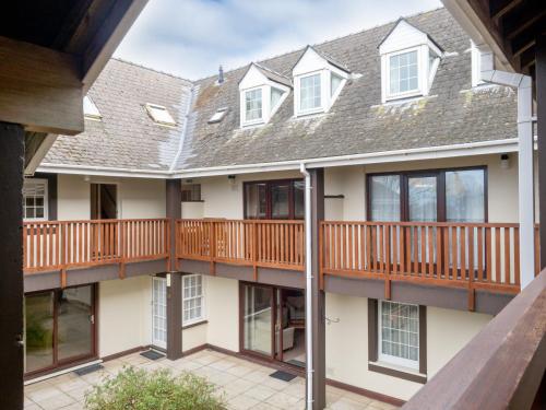 anterior view of a house with a deck at Galwad y Mor in St. Davids