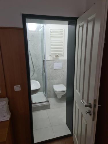 Koupelna v ubytování Altan Hotel