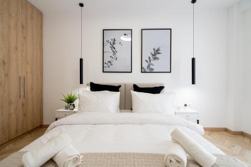 Posteľ alebo postele v izbe v ubytovaní Pagrati's best apartment
