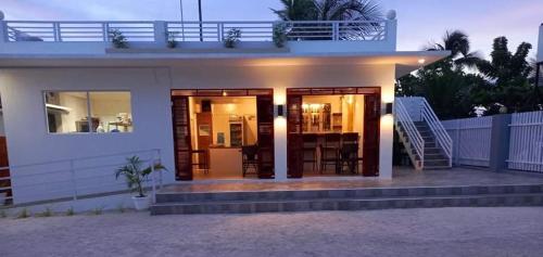 a house with a view of the front of it at Maykenn Beach in Bantayan Island