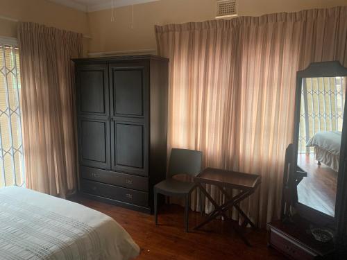 Ένα ή περισσότερα κρεβάτια σε δωμάτιο στο Amaciko guesthouse glenmore