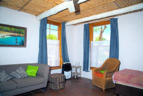Χώρος καθιστικού στο Aloe Guest House