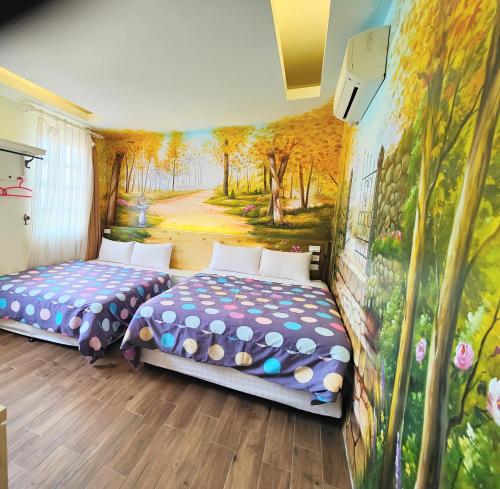 เตียงในห้องที่ Sinyuange B&B