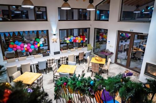 an overhead view of a restaurant with tables and chairs at Къщички Синьо лято, Черноморец - Варна - Blue Summer Houses Varna in Varna City