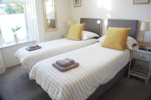 Postel nebo postele na pokoji v ubytování Barns Serviced Accommodation