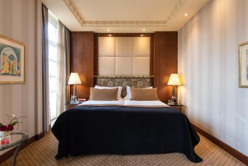 Postel nebo postele na pokoji v ubytování King David Hotel Jerusalem