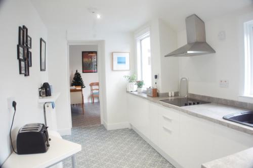 Kuchyň nebo kuchyňský kout v ubytování Barns Serviced Accommodation
