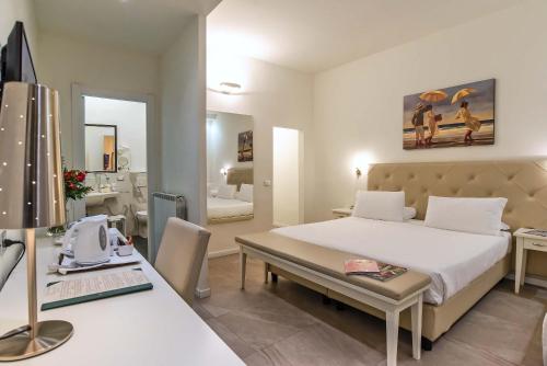 Cama o camas de una habitación en Hotel Accademia