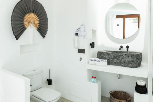 a bathroom with a sink and a mirror at Villa Atlantis I in La Asomada