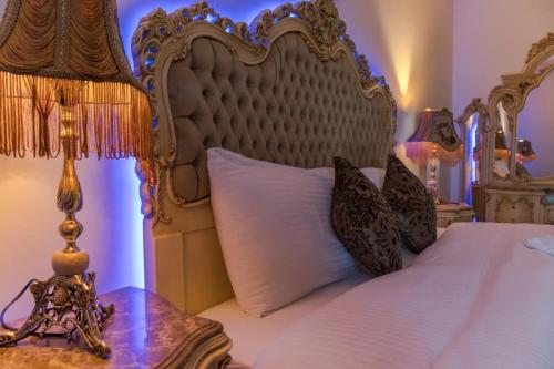 Ένα ή περισσότερα κρεβάτια σε δωμάτιο στο Gleem Luxury Apartments Elite