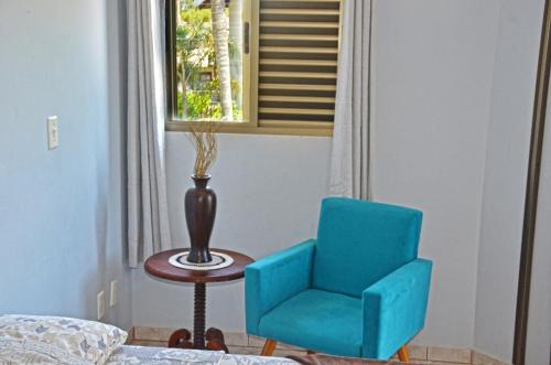 Ruang duduk di La Ferrugem Suites - 100 mts da Praia