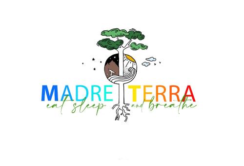 a tree with a hand drawn illustration of a madine terra regenerative plant at MADRE TERRA in Uvita
