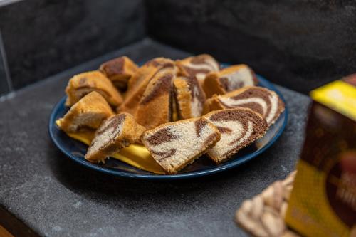 a blue plate of toast on a table at U Komárků in Špindlerův Mlýn