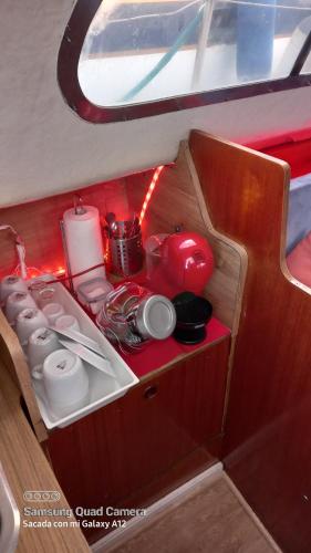 a small kitchen on a boat with a sink at Barco el viento in Barcelona