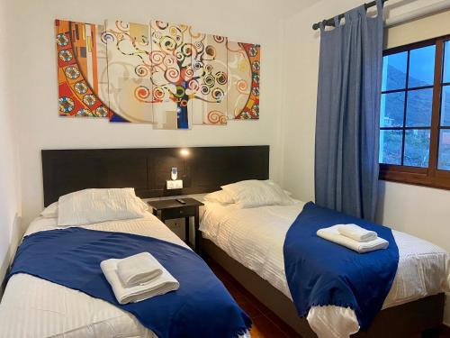 Postel nebo postele na pokoji v ubytování Casa El Descanso Azul A