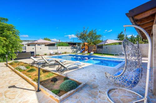 Holiday Home Tower with private pool, sauna and quads