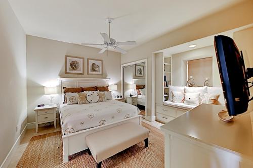 Кровать или кровати в номере Turquoise Place #2205C