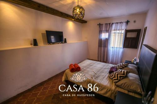 TV a/nebo společenská místnost v ubytování Casa 86