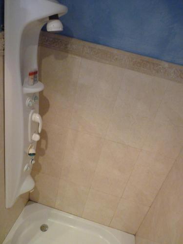 a bathroom with a shower with a toilet in it at Marina de Campios in Comillas
