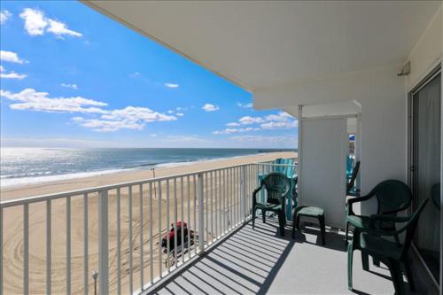 a balcony with a view of the beach at El Capitan in Ocean City
