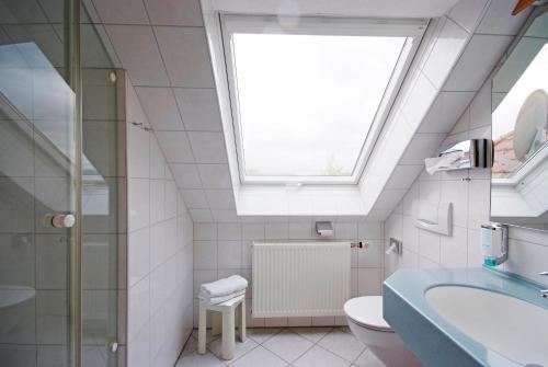 Koupelna v ubytování Hotel Gasthof Jägerhaus