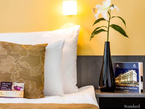 Postel nebo postele na pokoji v ubytování Kreutzwald Hotel Tallinn