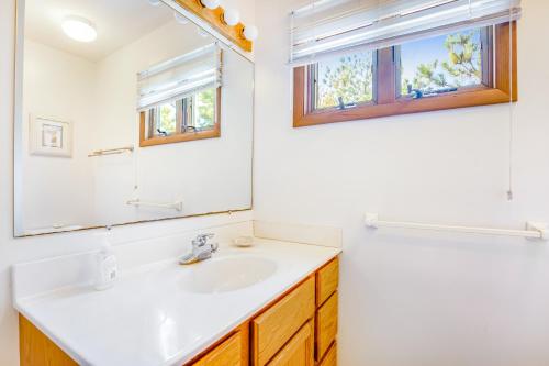 a bathroom with a sink and a mirror at Town of Fenwick island --- 1310 Bunting in Fenwick Island
