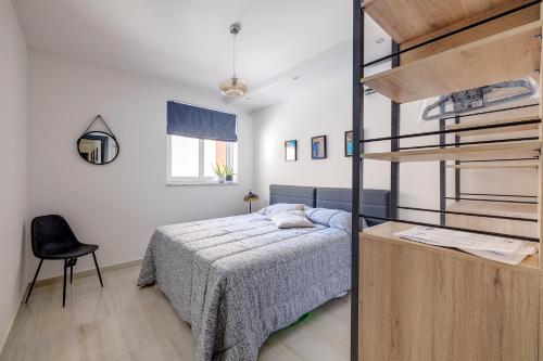 Postel nebo postele na pokoji v ubytování Chic 2BR Apartment, Ideal Location
