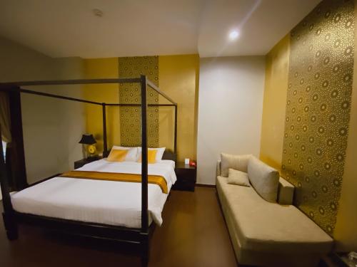 Postel nebo postele na pokoji v ubytování The Desiign Hotel - SHA
