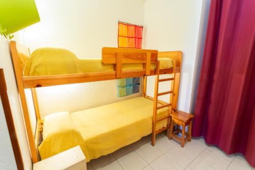 Postel nebo postele na pokoji v ubytování Frontera Blanca Pedrous