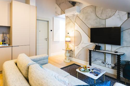 Телевизор и/или развлекательный центр в The Lift Apartments by RIDAN Hotels