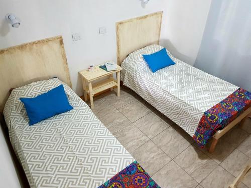 Postel nebo postele na pokoji v ubytování Cabaña La Antonia 1