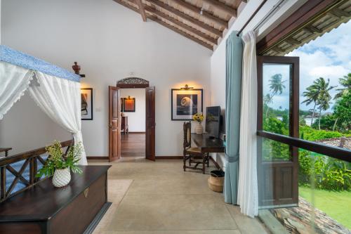 a view from the living room of a villa at Sundara by Mosvold in Balapitiya