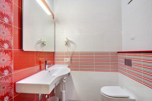 Et badeværelse på Chalet Meridiana Appartamento 10