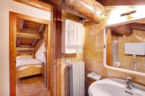 Kúpeľňa v ubytovaní Chalet Meridiana Appartamento 11
