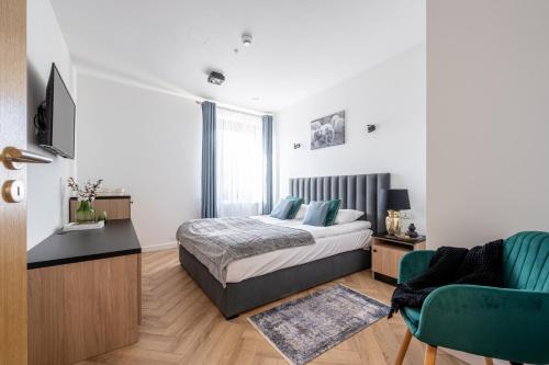 Posteľ alebo postele v izbe v ubytovaní Modom Holiday Szymony 15 B Aparteo
