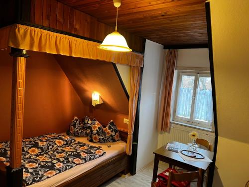 Ein Bett oder Betten in einem Zimmer der Unterkunft Gaststätte Braustübchen