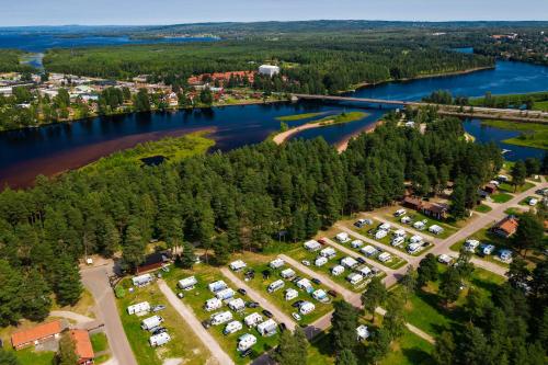 an aerial view of a park next to a river at First Camp Moraparken - Dalarna in Mora