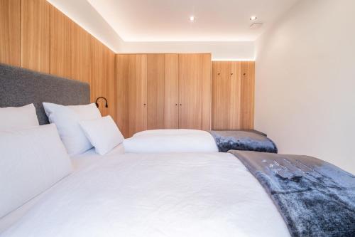 Ένα ή περισσότερα κρεβάτια σε δωμάτιο στο Chalet & Appartement Zingerlehof Trens