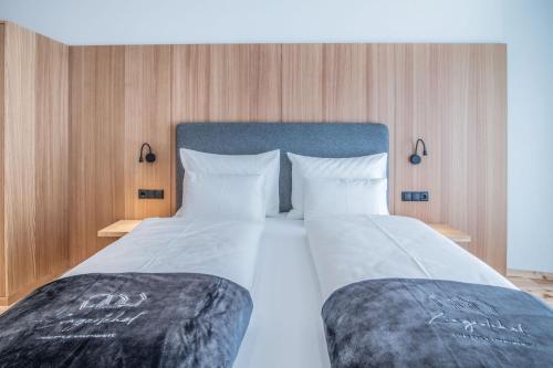 Ένα ή περισσότερα κρεβάτια σε δωμάτιο στο Chalet & Appartement Zingerlehof Trens